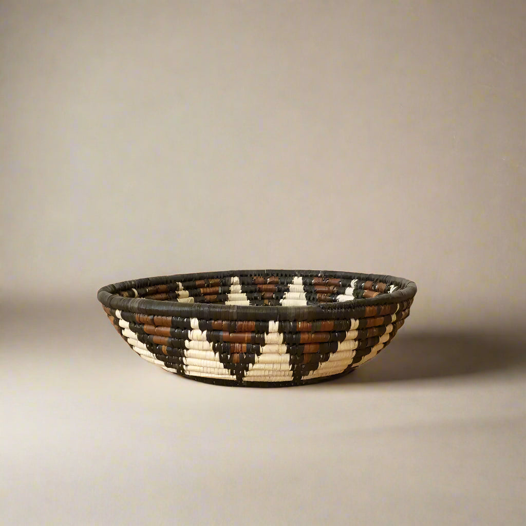 Handwoven African Zulu Bowl with geometric pattern in dark brown and off-white colors