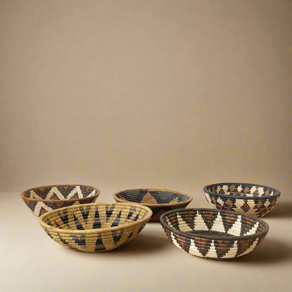 Colorful handmade Zulu bowl collection with geometric patterns, perfect as African Zulu bowls