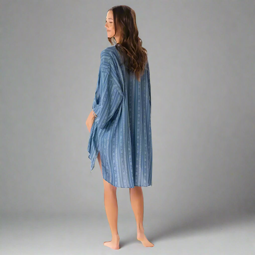 Woman in blue and white striped handmade beach cover, Aloha Tribal Cover Up style