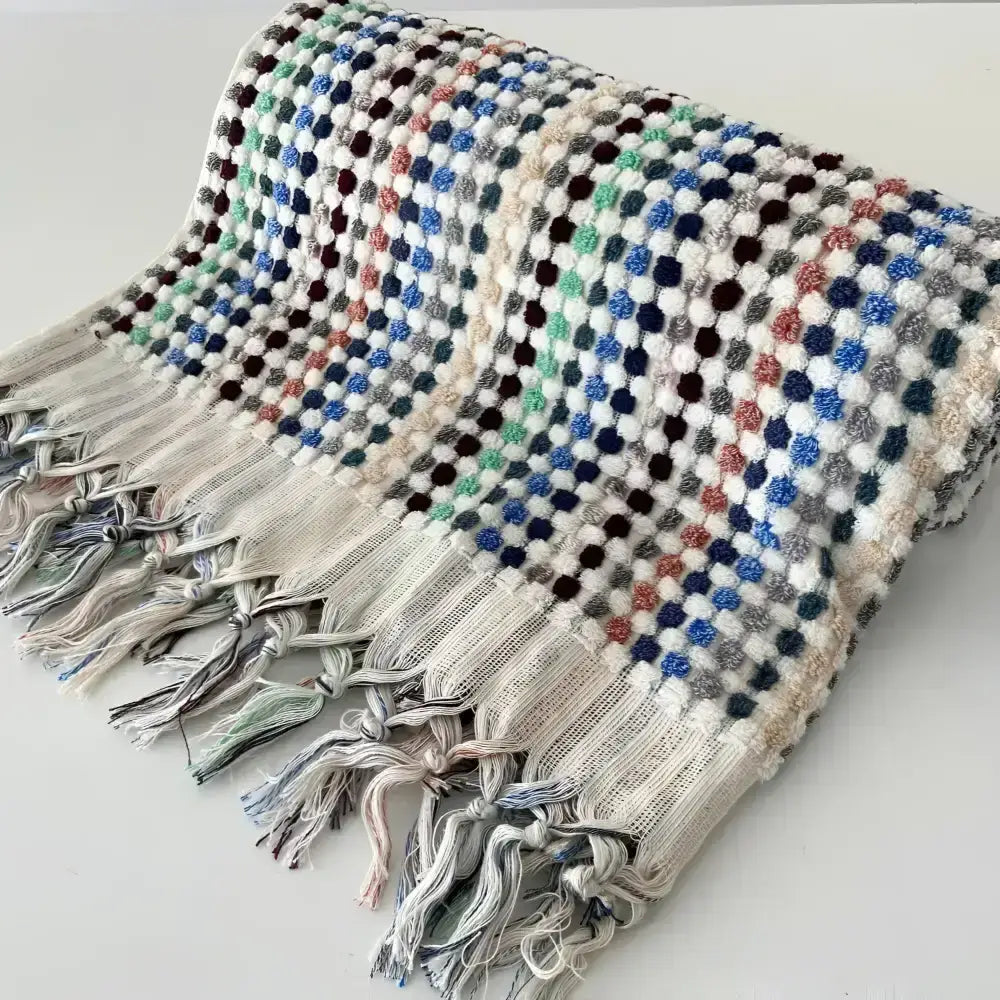 Colorful patterned Turkish towel with tassels from Birdbath Hand Loomed Turkish Towel Gift Set featuring authentic Turkish bath style
