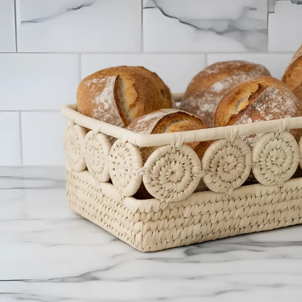 Blossom Nest palm medallion basket with rustic sourdough loaves