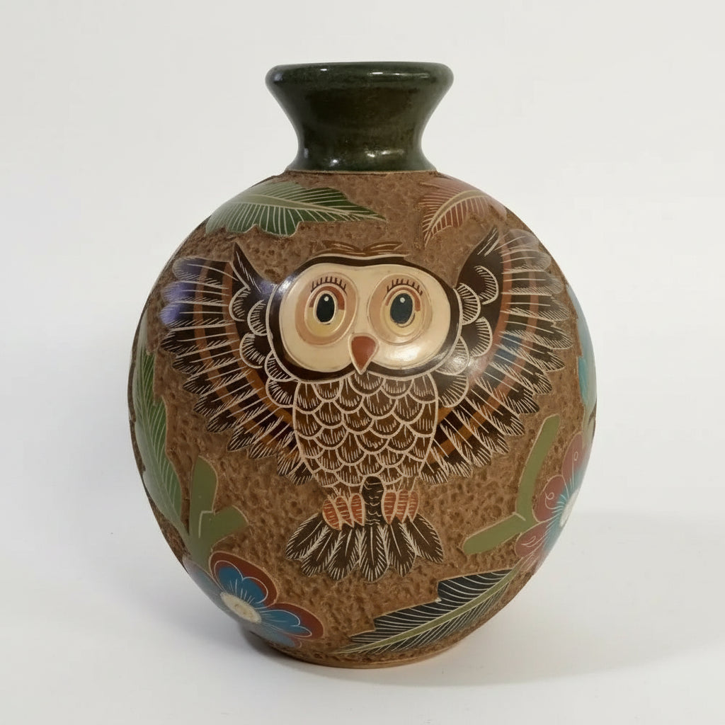 Brown carved clay owl vase with intricate carvings and floral design for home decor