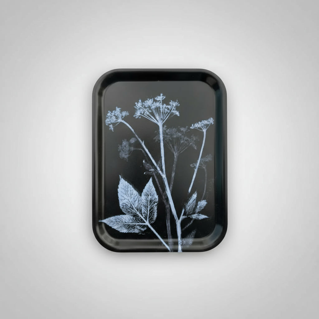 Black rectangular ground elder serving tray with white floral design made from eco-friendly birch wood