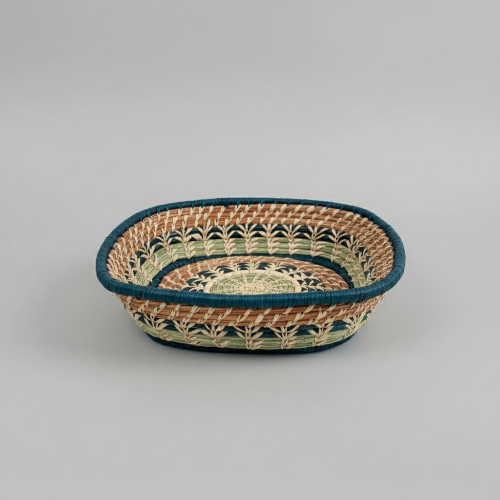 Colorful Guatemalan basket Tikal with woven design, teal rim, and natural green hues