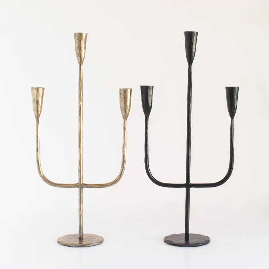 Hand Forged Iron Candelabra in brass and black on light background