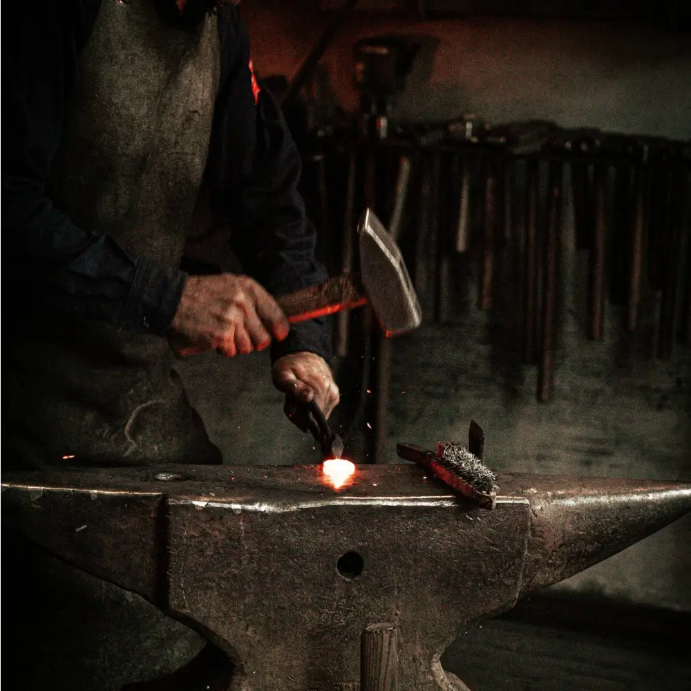 Hand Forged Iron Candle Stands being made by blacksmith