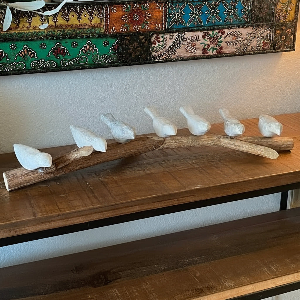 Handmade eco-friendly wooden branch with seven handcrafted white ceramic bird figurines