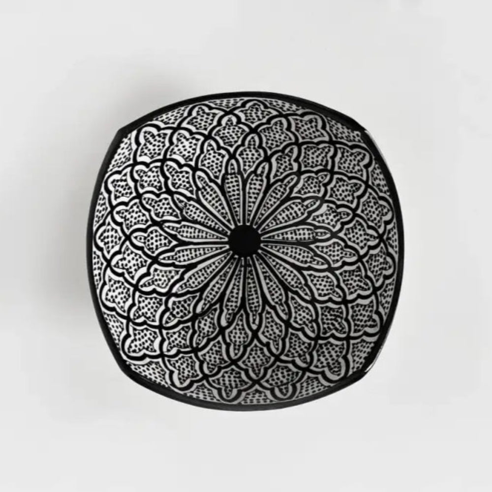 Black and white handcrafted ceramic bowl with intricate mandala pattern from Safi Morocco