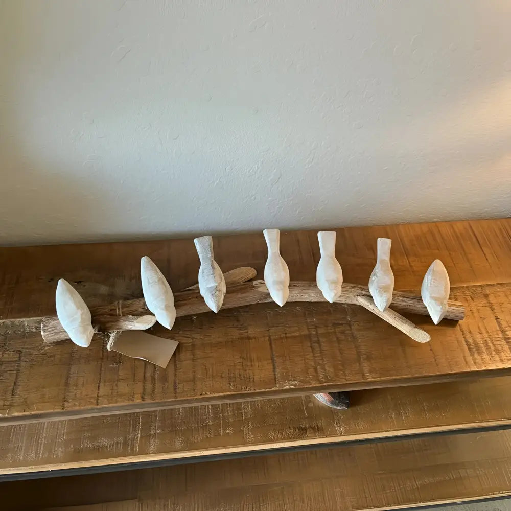 Handmade eco-friendly wooden garland with seven handcrafted white bird figurines