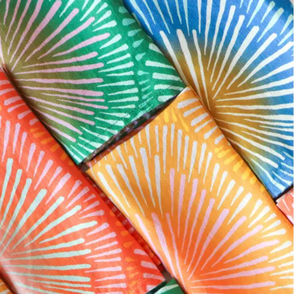 Colorful handmade eco-friendly linen napkins with sunburst pattern set of 4
