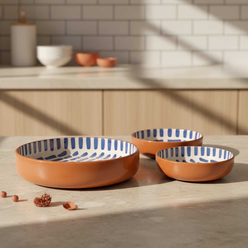Three handmade nested Moroccan ceramic bowls with blue dash patterns perfect for home decor
