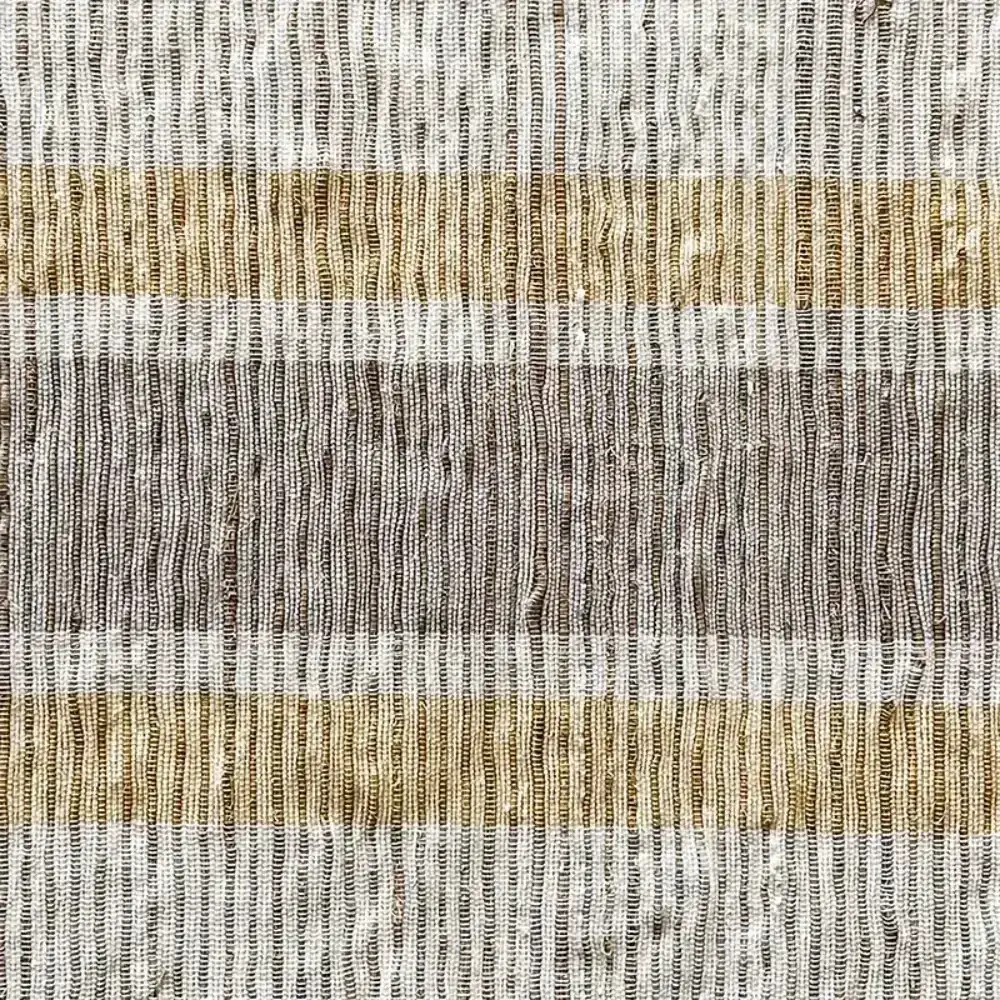 Handwoven vetiver table runner in muted gray and beige stripes with textured woven plaid fabric design