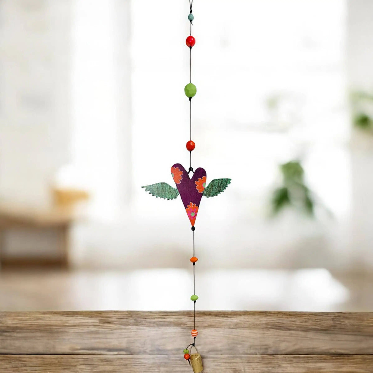 Purple heart wings wind chime with green wings and colorful beads