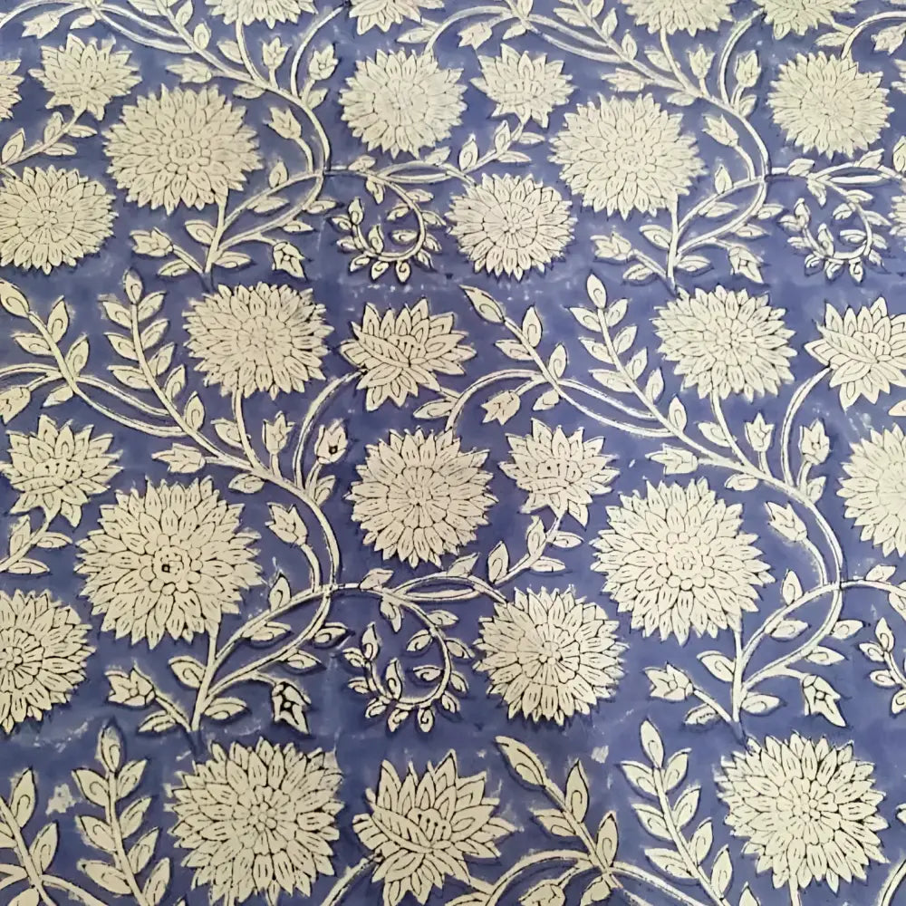 Blue cotton block print tablecloth with white floral pattern and striped borders