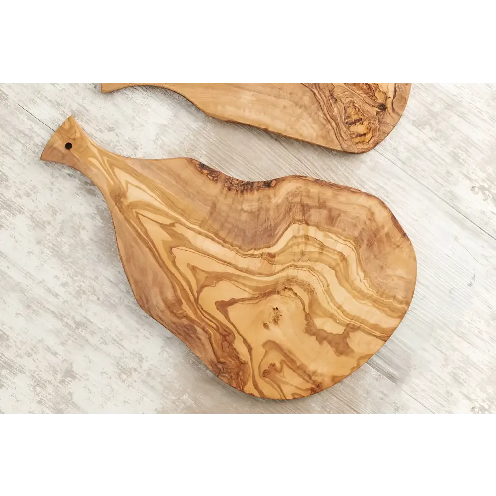 Italian Olivewood Charcuterie and Cheese Paddle Board on a light table