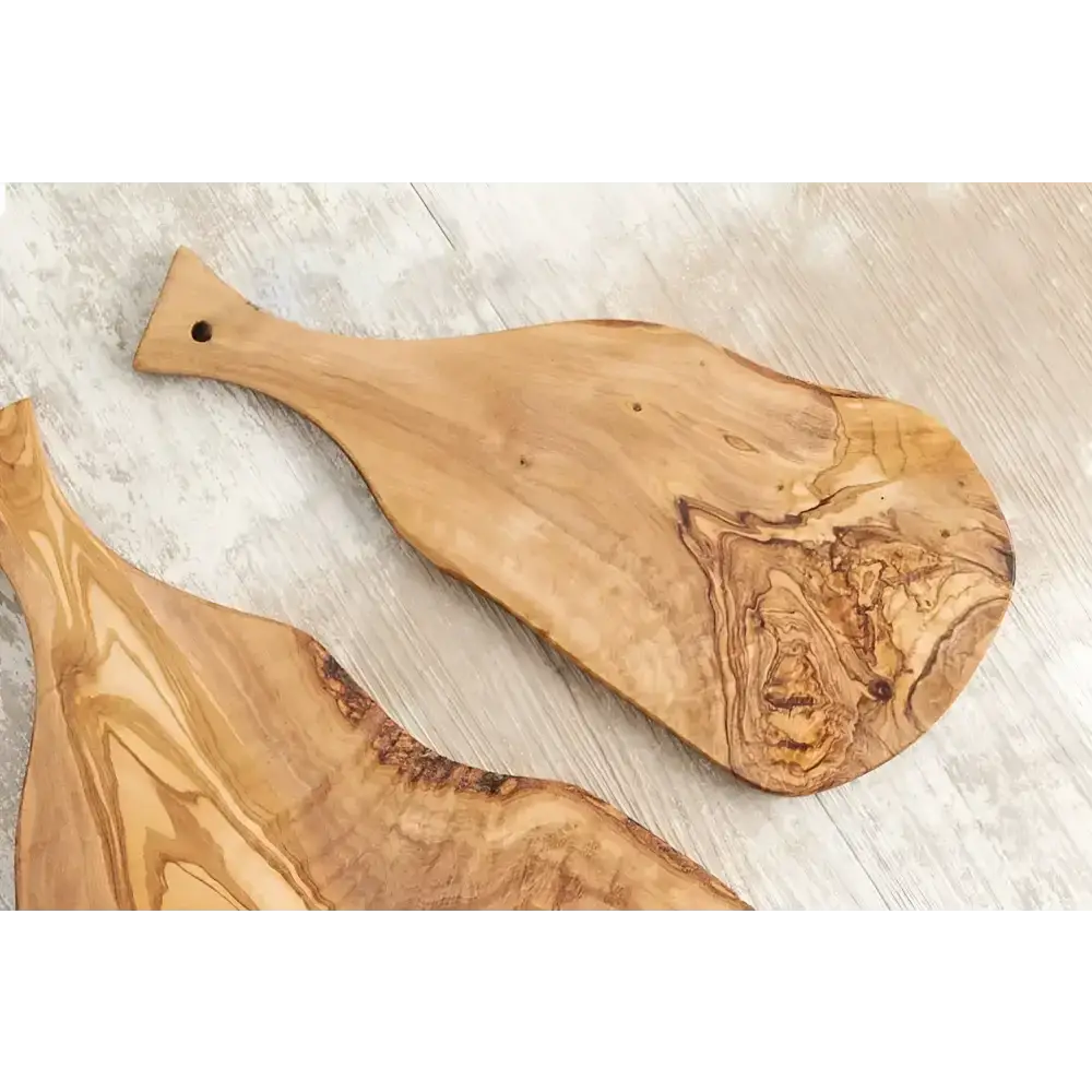 Two Italian Olivewood boards with unique grain patterns and bark edge design