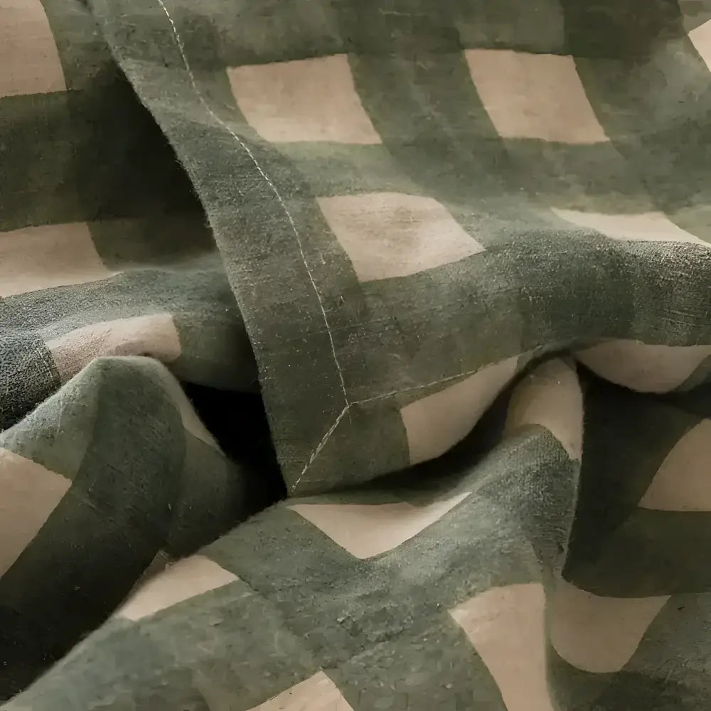 Fabric with green checkered pattern.
