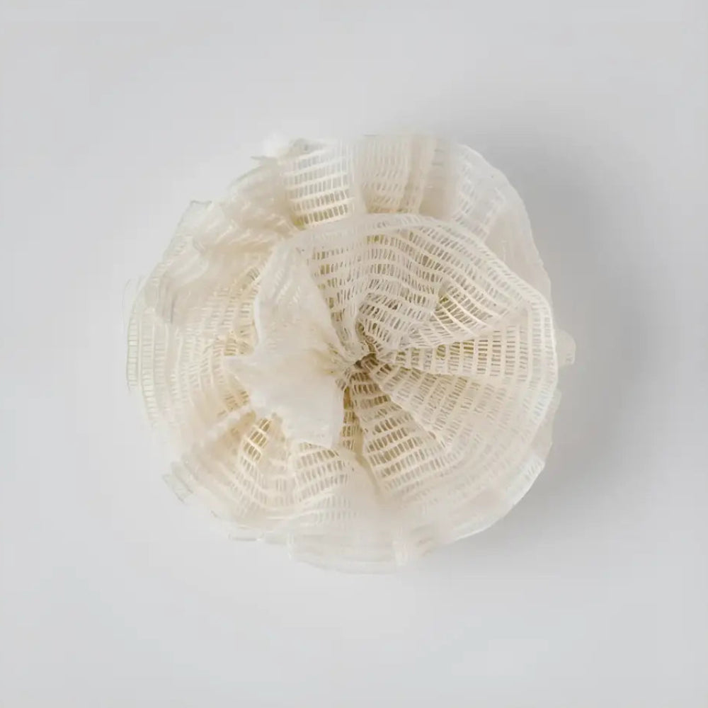 Off-white textured mesh Ramie Shower Pouf with ruffled flower design for natural exfoliation