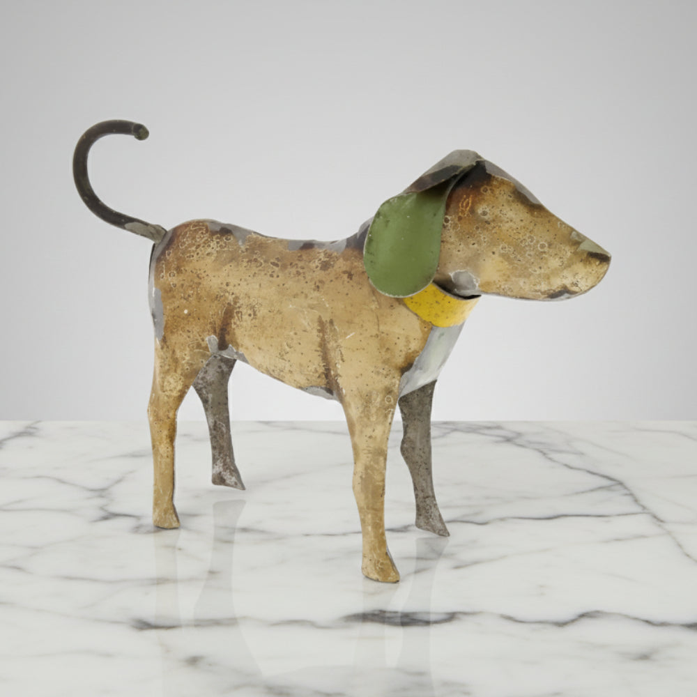 Reclaimed metal dogs figurine with green ears, curled tail, and yellow collar