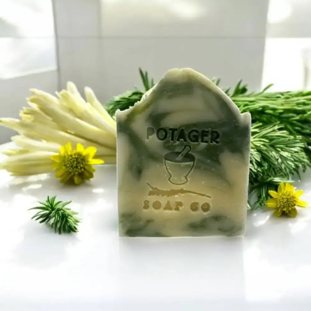 Rosemary Lemongrass Soap Bar with embossed mortar and pestle, green and white swirl