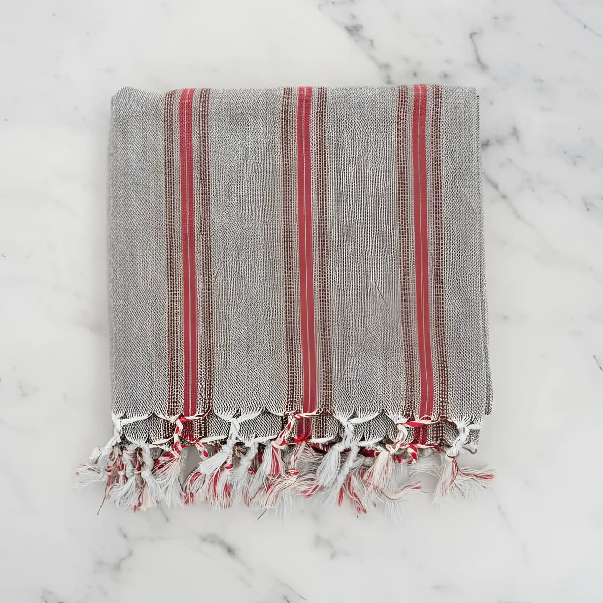 Gray linen turkish hand towel with bold red vertical stripes and fringed edges premium cotton hand towels