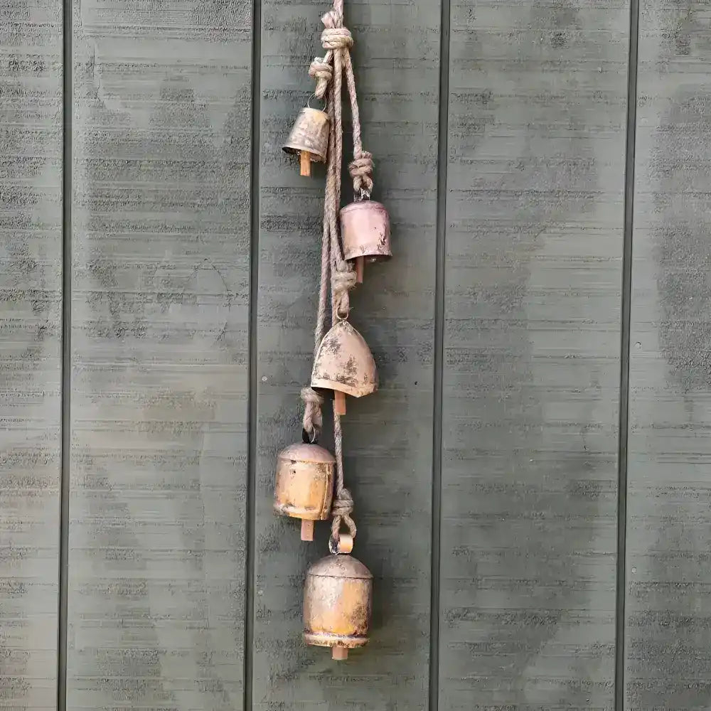 cascading bells on a wooden background