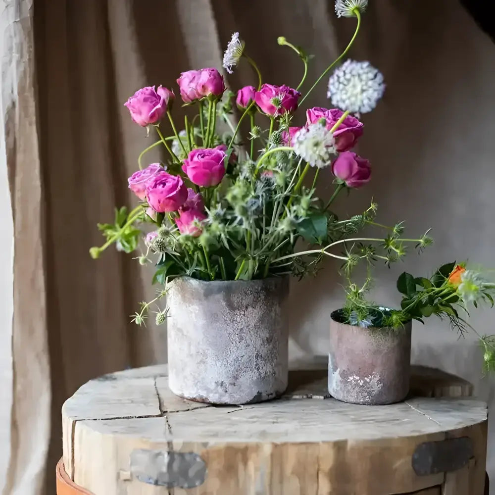 Rust Blue Vase with rustic pink roses and thistles in a handmade glass vase
