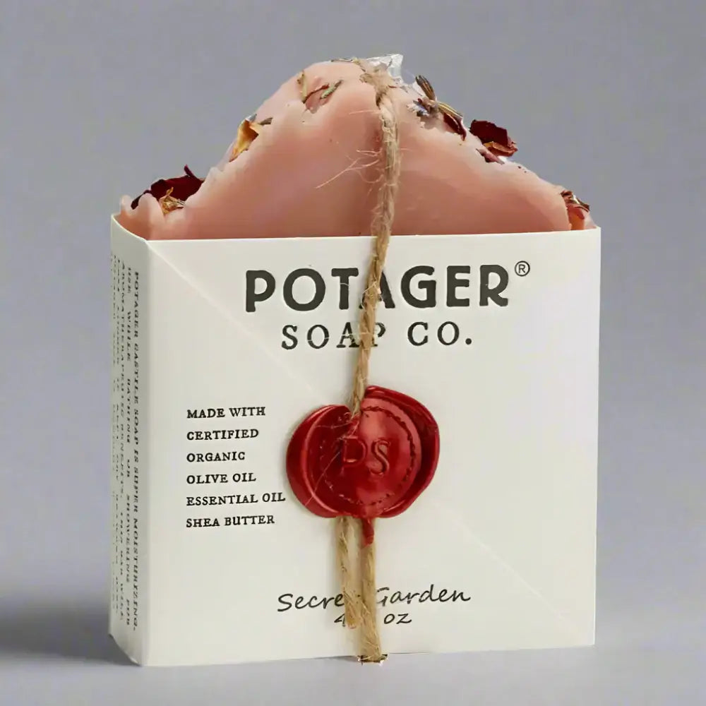 Artisan Secret Garden Soap with dried petals, tied with twine, from Garden Wild Earth