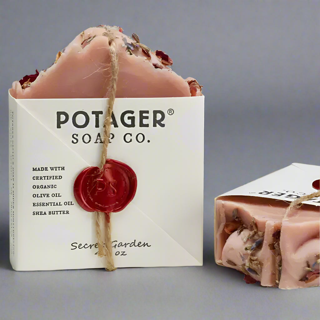 Pink Secret Garden Soap Bar with botanicals, twine, and wax seal in white wrapper