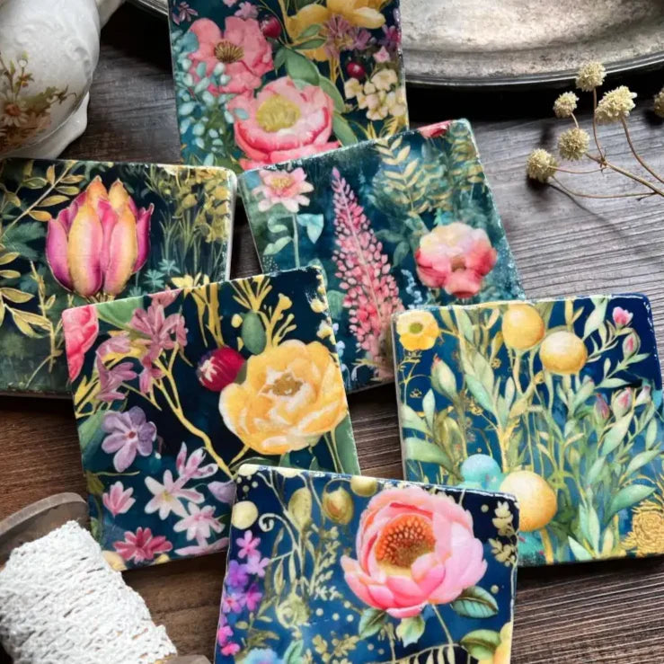 Square tumbled marble tiles with watercolor floral patterns from Midnight Garden collection