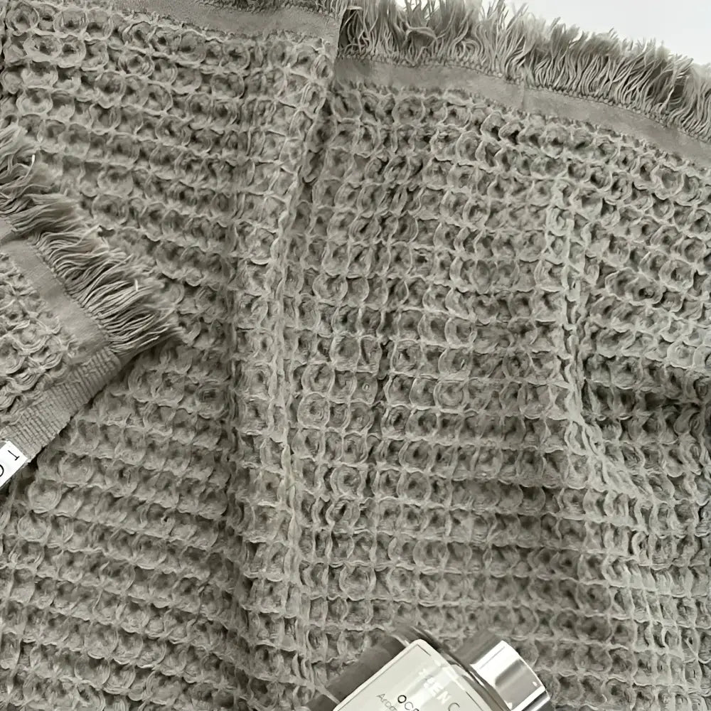 Waffle weave Turkish hand towel with exceptionally soft fibers.