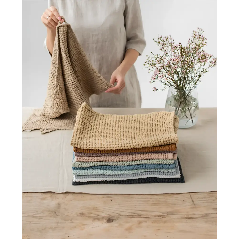 Colorful linen-cotton blend waffle kitchen towel stack showing specialized waffle weave