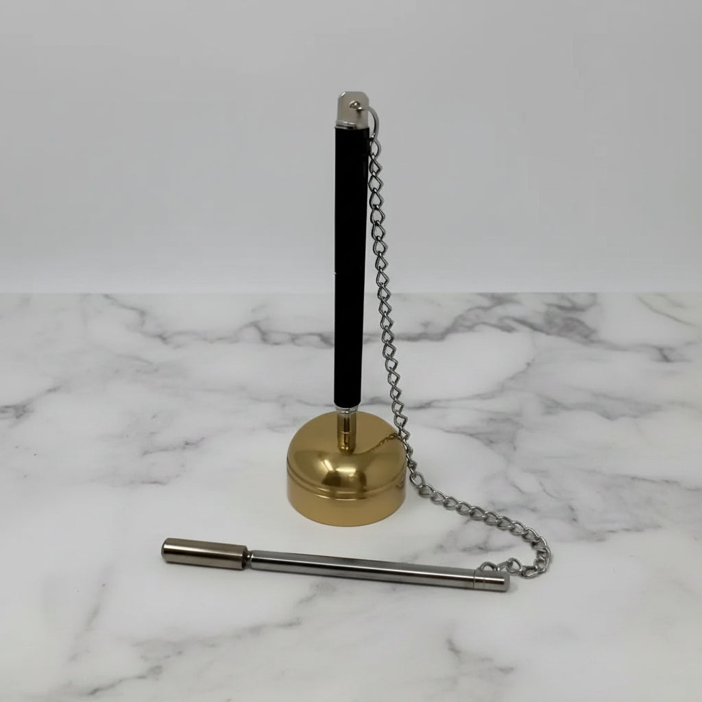 Black and gold zen bell pen stand with silver chain attachment and striker for resonant tone perfect use