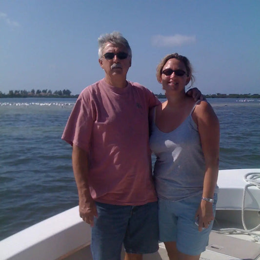Two people on a boat with stained glass windows at Rookery Home’s handmade memories