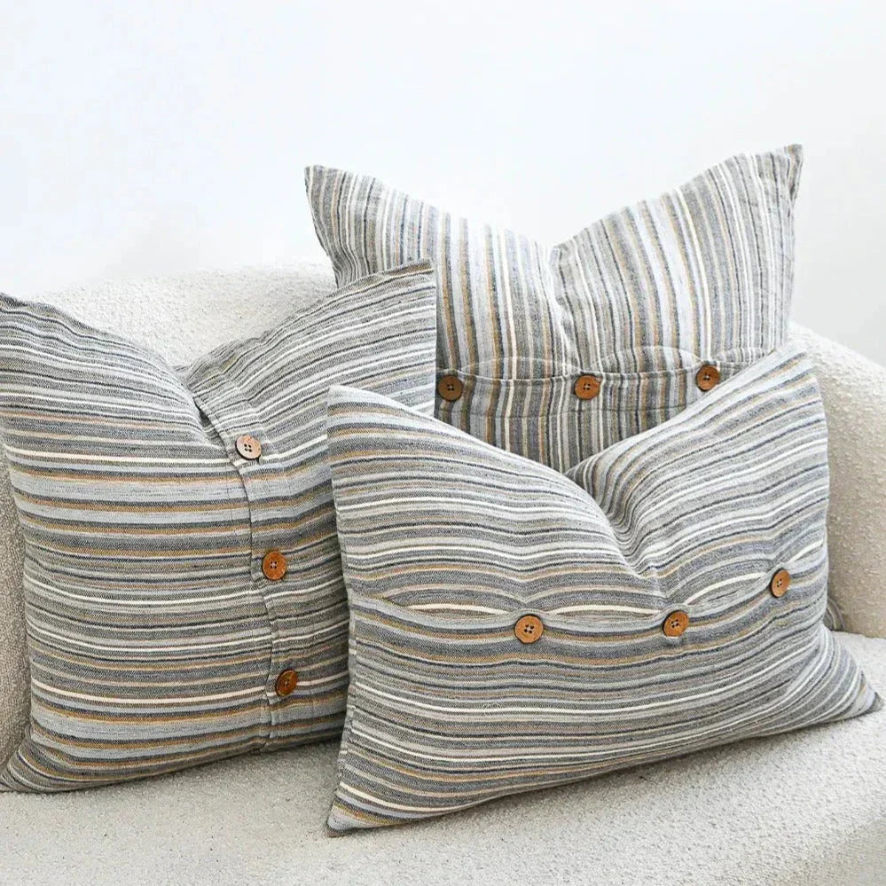 Three striped throw pillows with wooden buttons from Accent Pillows for Cozy Homes