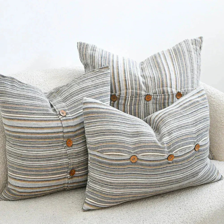 Three striped throw pillows with wooden buttons from Accent Pillows for Cozy Homes