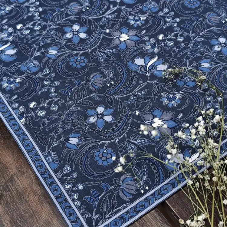 Handmade navy blue floral paisley cotton rug with white border