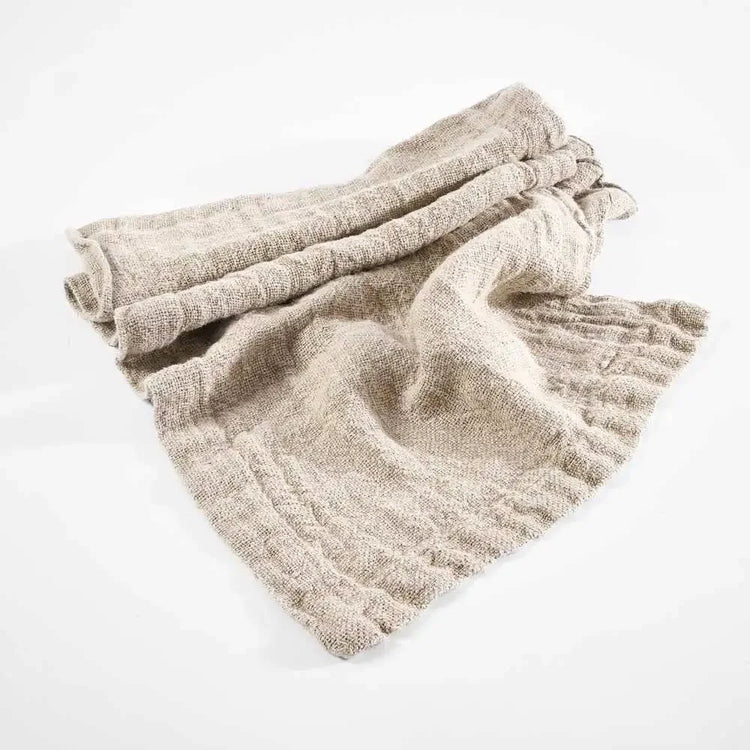Light brown linen blanket with textured weave from Linen Textiles Collection for everyday luxury