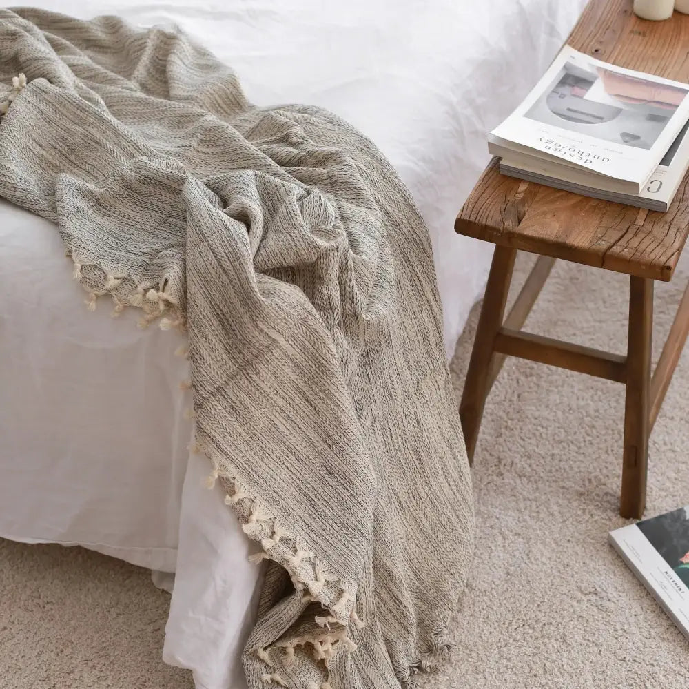 Light gray woven throw blanket with tassels from Natural Cotton Textiles Collection
