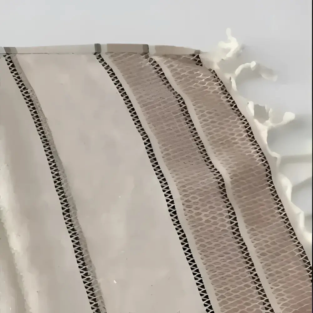Unfolded brown striped linen towel