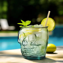 Skull-shaped glass with mojito, mint, lime; perfect for your sugar skull tumbler collection