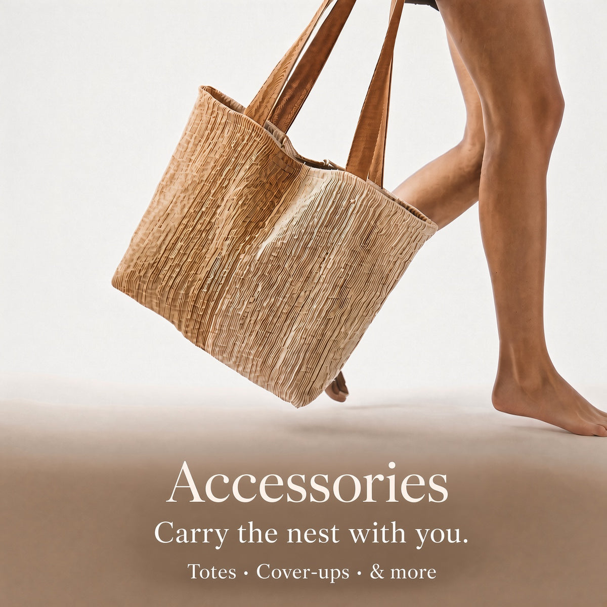 A person carrying a large woven straw tote bag with brown handles against a clean light background, with the text 'Accessories Carry the nest with you. Totes • Cover-ups • & more' at the bottom.