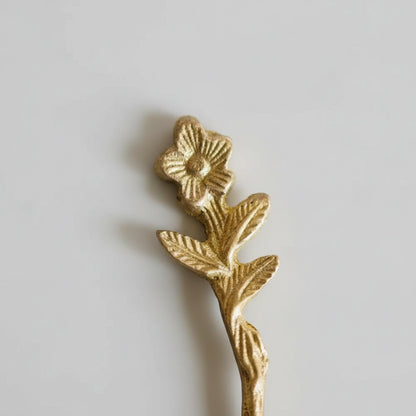Gold floral brooch with intricate leaf details on Adavi Brass Mini Serving Utensils