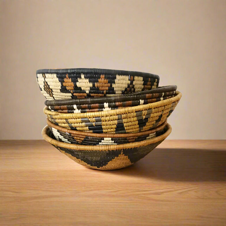 Stack of five handmade Zulu baskets with geometric patterns for African Zulu Bowl decor