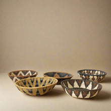 Colorful handmade Zulu bowl collection with geometric patterns, perfect as African Zulu bowls