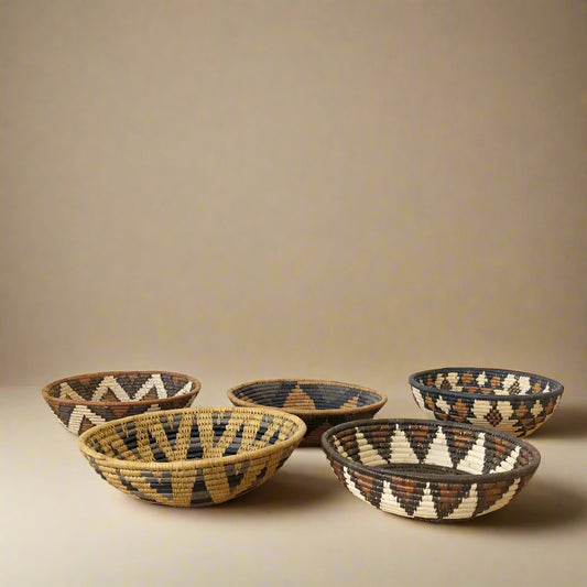 Colorful handmade Zulu bowl collection with geometric patterns, perfect as African Zulu bowls