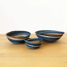 Colorful South Africa city lights woven baskets with blue, white, and orange stripes