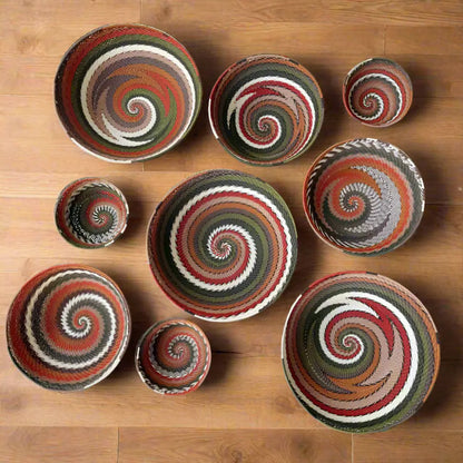 African Zulu wire bowl collection with handcrafted woven spiral patterns from recycled telephone wire