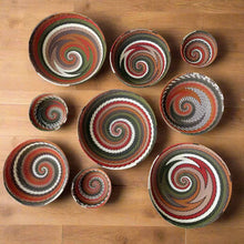 Handcrafted African Zulu wire bowls from recycled telephone wire, spiral patterns