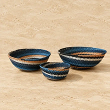 Handwoven african zulu bowls in blue white and tan stripes made from recycled telephone wire city lights design